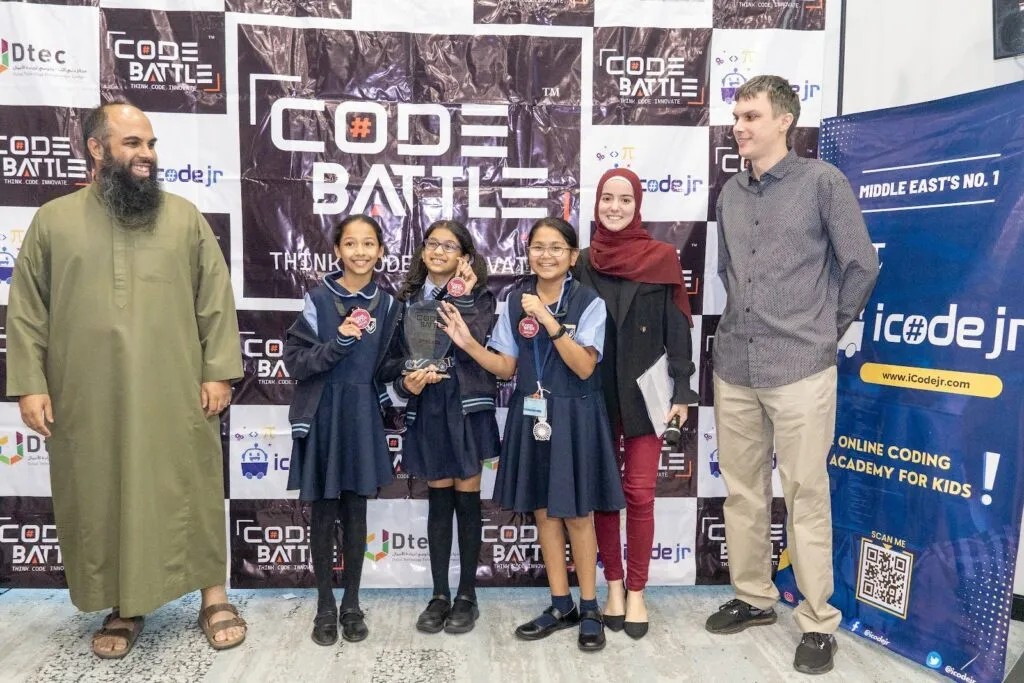 A Grades 1–4 team with their trophies at the Code Battle 2023 national final