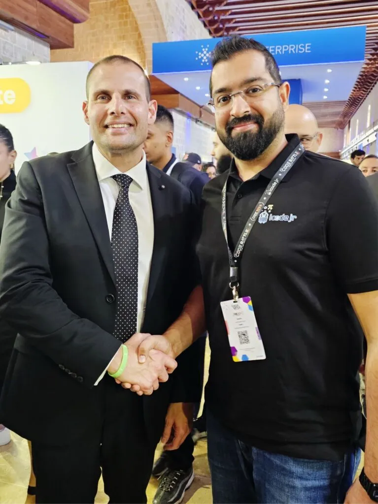 Hannan Moti, Founder and CEO of iCodejr, shakes hands with Robert Abela, Prime Minister of Malta
